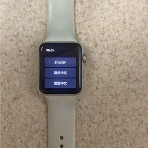 Apple Smartwatch with Silver Case and Beige Band